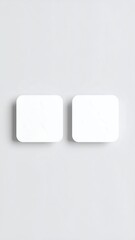 Two blank white rectangular objects