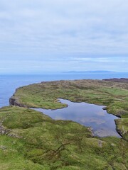 Ocean Pools Under Cloudy Sky in Fair Head, Northern Ireland