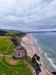 Dramatic shot of Mussenden Temple Overlooking the Ocean