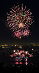Fireworks display over a city at night, colorful explosions.