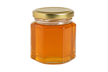 Golden honey in glass jar with metal lid isolated against black background for product presentation