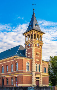 Old post office in Spremberg Oberlausitz with architecture of red brick, tower and street view in the afternoon