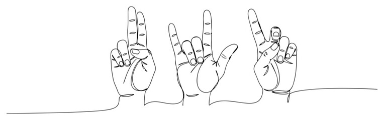 Rock and Peace Hand Gestures at a Music Concert
