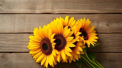 Sunflower bouquet on a rustic wooden surface with warm directional lighting.