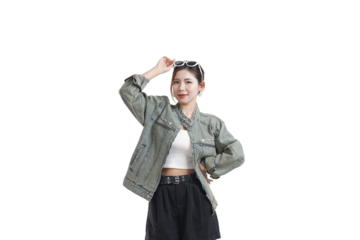 Stylish Young Woman Posing: A stylish young woman poses with confidence, dressed in a contemporary jacket, fashionable sunglasses, and an engaging presence.