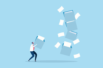 Overwhelmed businessman struggling with a cascade of falling documents and file folders