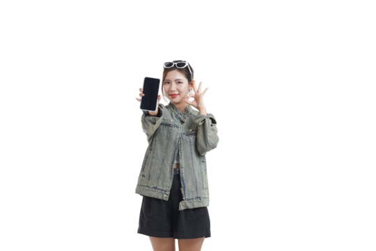 Young Woman Showcasing Phone: A stylish young woman, radiating confidence and charm, enthusiastically presents her phone screen, suggesting the myriad possibilities it holds. 