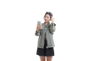 Smartphone Interaction: A stylish individual is engrossed in a digital exchange on a handheld smartphone device. capturing a candid scene of tech engagement.