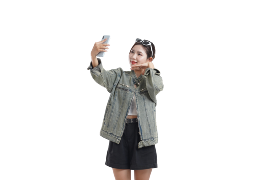 Selfie with a Smile: A stylish individual, radiating positivity, captures a selfie with a mobile phone, embodying the essence of modern connection and joyful self-expression. - Powered by Adobe