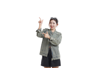 Cheerful Demonstration: A woman with sun glasses on head joyfully presents a clear and concise direction or concept, offering a compelling visual guide.