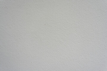 White Plastered Wall. Plain white plastered wall with fine textured surface. Minimalist background for design or photography.