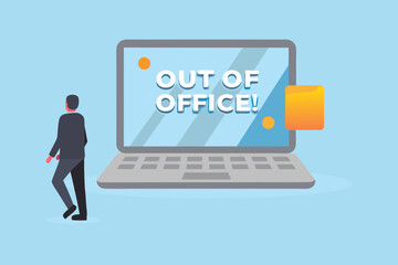 Businessman walking away from a laptop displaying out of office message on screen