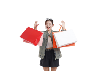 Shopping Joy: A young woman with joyful eyes shows off the bags of shopping she just acquired