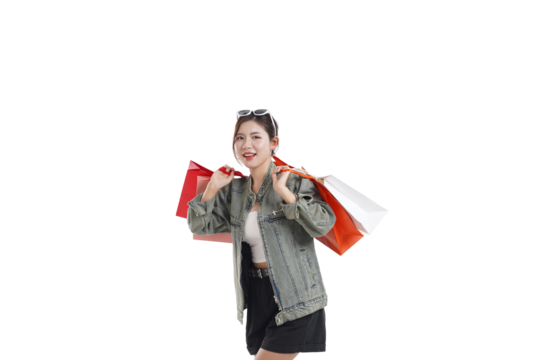 Joyful Shopping Spree: A vibrant and happy woman carries shopping bags, radiating excitement and contentment.
