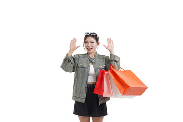 Shopping Spree Excitement: A cheerful individual beams with excitement, holding a cluster of vibrant shopping bags. Capturing the thrill of retail therapy and personal indulgence.