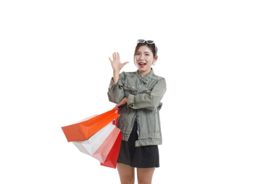 Retail Therapy Delight: A cheerful woman waves enthusiastically, her arms laden with vibrant shopping bags. captured at the vibrant shopping spree!