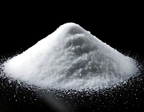 Pile of white powder on black background