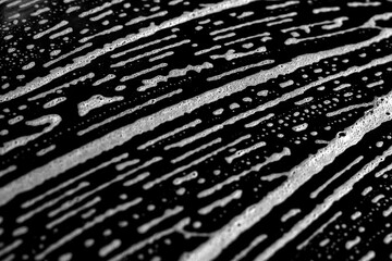 Chaotic distressed abstract art.  Soft flowing abstract pattern in black and white, useful for decoration, wallpaper, and creative layouts.