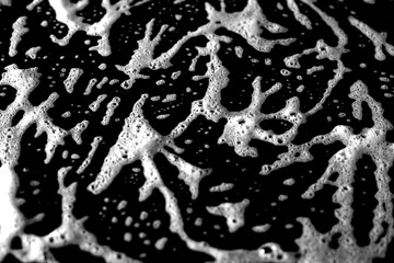 Symmetrical black and white design. Chaotic abstract texture with rough lines and high contrast, great for edgy modern graphics.
