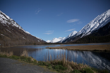 reflective lake in a mountain range