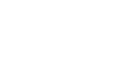 Bright spotlight beam illuminating dark space creating atmospheric effect