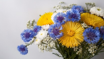 Colorful Bouquet Of Statice Flowers In Yellow Blue And White Colors On Light Background