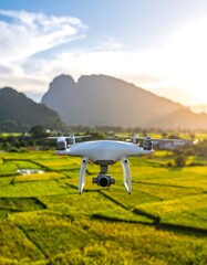 Drone soaring over rice paddies