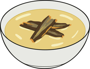 Bowl of creamy soup with dark, crispy toppings.