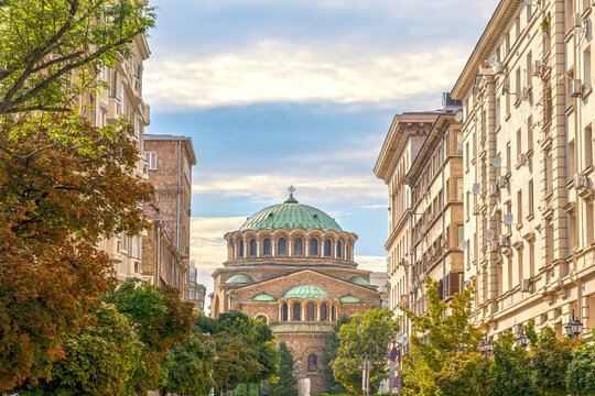 St Nedelya Church, Holy Sunday Church is an Eastern Orthodox church in Sofia, seen through the buildings of a nearby street.