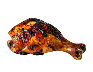 Grilled chicken leg drumstick with sticky charred glaze, crispy skin and smoky caramelized spots on isolated background