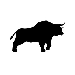 Black silhouette of a bull with horns standing on a white background