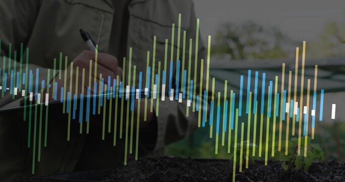Writing man in tan jacket taking notes on greenhouse bench, with seedling and data overlay