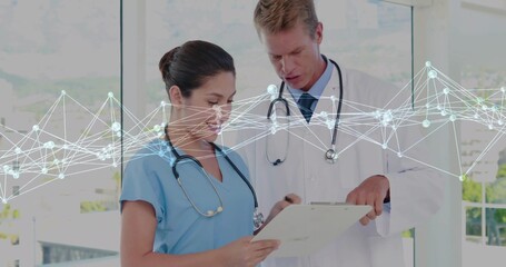 Examining nurse and doctor holding chart in medical office with stethoscopes and network overlay