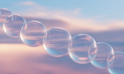 A chain of translucent spheres against a soft, pastel sky