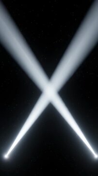 Dynamic spotlight beams in a star-like pattern against a dark, starry sky, creating a dramatic