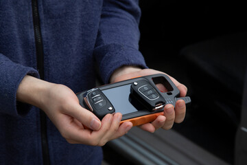 Production of car keys, Programming of car keys and repair