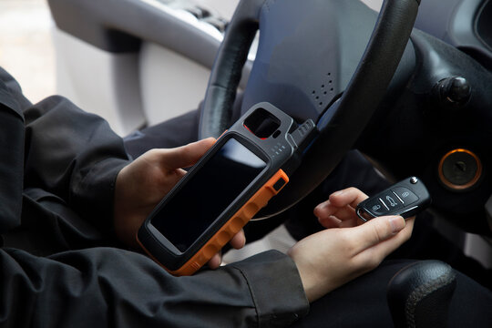 Production of car keys, Programming of car keys and repair