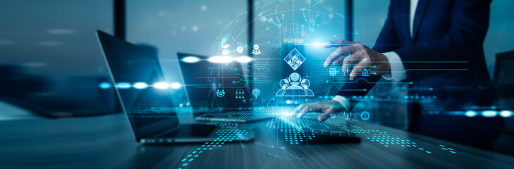 Leader using laptop with analysis data Teamwork coordinating groups enhancing collaboration supporting projects improving communication ensuring performance strengthening unity.