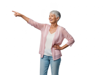 Joyful senior woman points with remote control indicating a direction for entertainment transparent background
