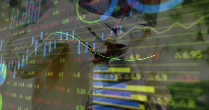 Overlaying candlestick bars and neon line graphs atop metallic knight helmet sculpture, workspace - Powered by Adobe