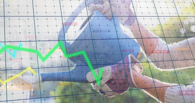 Watering garden plants with blue can by gloved hands in yard, showing chart notification overlays - Powered by Adobe