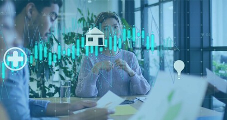 Woman wearing purple sweater discussing data overlays in conference room, with paper pens icons