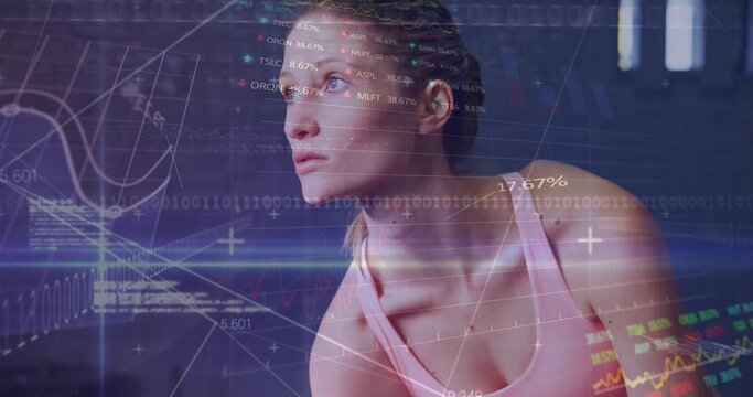 Showcasing female athlete wearing pink sports top in dark studio, with digital data overlays