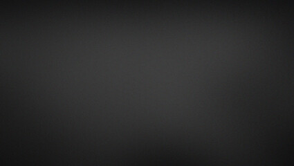 A grainy texture effect with a simple black background with a slight gradient, perfect for use as a backdrop or texture in graphic design and photography projects