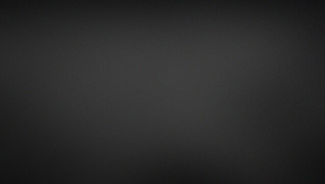 A grainy texture effect with a simple black background with a slight gradient, perfect for use as a backdrop or texture in graphic design and photography projects
