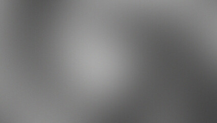 A grainy texture effect with a soft gray gradient background with subtle variations in tone, creating a smooth and calming visual effect, perfect for use as a backdrop or texture