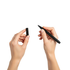 Young caucasian woman's hands holding a black chisel-tip marker hovering over a pristine transparent studio background with copy space, top-down view, concept of creative process genesis