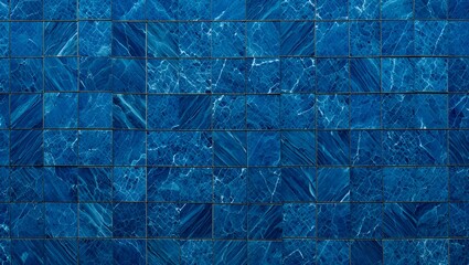 Obraz premium Abstract textured background of deep blue shimmering tiles