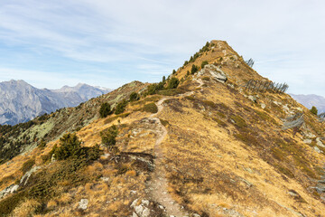 Nendaz crest or ridge hiking with view on Barrage de Cleuson in the autumn, Valais, Switzerland