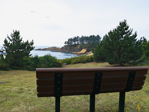 An Empty Bench on a Cloudy Oregon Coast